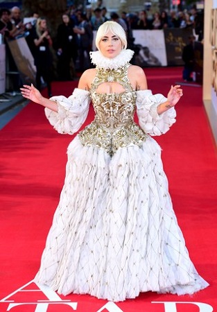 Lady Gaga flaunting her gown which was made by Sarah Burton